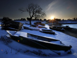 Sun Rises in Mackerel Cove on Bailey Island Where Fishermen's Skiffs Wait Out the Winter, in Maine Photographic Print