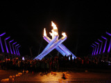 Surrounding the Olympic Flame after the Opening Ceremony of the Vancouver 2010 Olympics Photographic Print
