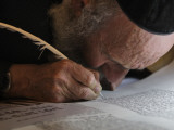 Ultra-Orthodox Jew Writes Some of the Last Words in a Torah Scroll Photographic Print