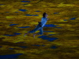 Performer Soars Through the Air During the Opening Ceremonies for the XXI Olympic Winter Games Photographic Print