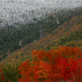 Tram Cars Take Tourists Up Cannon Mountain in New Hampshire as Snow Meets with Changing Leaves Photographic Print