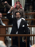 Former Iraqi President Saddam Hussein Berates the Court During their Trial in Baghdad Photographic Print