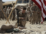 US Marine Pays His Respects to LCpl Joshua Bernard During a Memorial Service at Base in Afghanistan Photographic Print