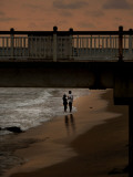 Couple Stand at Galle Face Beach, in Colombo, Sri Lanka Photographic Print