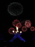 Fireworks Explode Behind the Olympic Flame at Opening Ceremony of Vancouver 2010 Winter Games Photographic Print