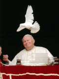Pope John Paul II Looks at a White Dove After the Angelus Prayer in St. Peter's Square, at Vatican Photographic Print