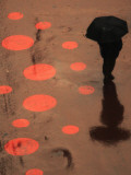 Pedestrian Makes His Way in New York's Times Square in the Rain Photographic Print