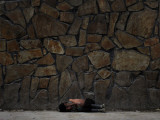 Afghan Boy Sleeps on Ground as He Begs for Alms in Kabul, Afghanistan Photographic Print