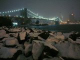 Snow Covered Rocks on the Brooklyn Shore of the East River Photographic Print