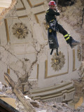 Firefighter as He Looks Inside the Damaged Dome of the Church of Santa Maria Del Suffragio Photographic Print