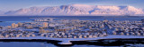 Buildings in a City with a Mountain in the Background, Mt Esja, Reykjavik, Iceland Lámina fotográfica por Panoramic Images Buildings in a City with a Mountain in the Background, Mt Esja, Reykjavik, Iceland Lámina fotográfica por Panoramic Images