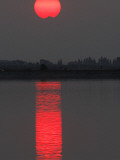 Sun Sets over a Lake on the Outskirts of Bucharest, Romania Photographic Print