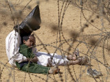 Iraqi Prisoner of War Confort His 4-Year-Old Son at a Regroupment Center for POWs Near Najaf Photographic Print