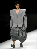 Model on Stage Displaying a Creation by Chinese Fashion Designer Ye Yaoya, Fashion Week in Beijing Photographic Print