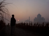 Farmer Looks at the Sunrise from His Field, with the Taj Mahal in Agra in the Background, India Photographic Print