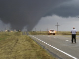 Driver Slows as a Tornado Crosses the Highway in Beaver County, Oklahoma Photographie
