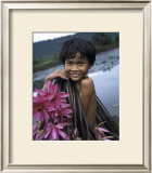 Cambodian Boy, Harvesting Water Lilies Prints by Russel Young
