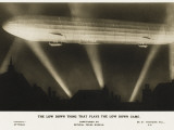 Zeppelin Illuminated by Searchlights Photographic Print