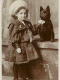 A Small Girl in a Sailor Suit Poses with Her Schipperke Photographic Print