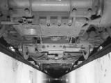 Undercarriage of a Train Photographic Print by Heinz Zinran
