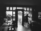 The Interior of a Cafe in Pleneuf, France Photographie par Vanessa Wagstaff