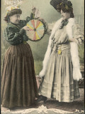 A Fortune-Teller Uses a 'Wheel of Fortune' Photographic Print