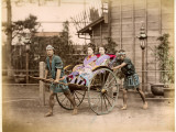 Two Well-Dressed Japanese Ladies Take a Ride in a Rickshaw Powered by Two Rickshaw Drivers Photographic Print