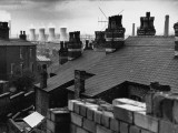 Cooling Towers Through the Rooftops - Manchester Photographic Print by Shirley Baker
