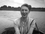 Photograph of a Woman on a Rowing Boat Photographie par Vanessa Wagstaff