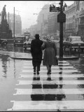 A Typical English Street on a Rainy Shopping Day: an Elderly Couple Use the Zebra Crossing Photographic Print by Henry Grant
