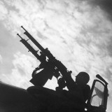 Machine Guns are Ready to Shoot a French Military Plane Photographic Print by Robert Hunt