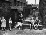 Children Playing in a Back Alley - Salford, Manchester 1962 Photographic Print by Shirley Baker