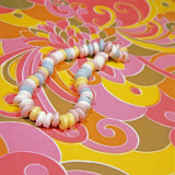 Psychedelic Candy Necklace Photographic Print by Wendy Idele