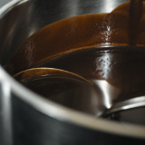 Melted Chocolate in a Pan with a Ladle in It Lámina fotográfica por Nicklas Albinsson Melted Chocolate in a Pan with a Ladle in It Lámina fotográfica por Nicklas Albinsson