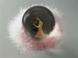Close-Up of Figurines of Dancers in a Snow Globe Photographic Print