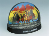 Close-Up of Figurines of Native American Horseback Riders in a Snow Globe Photographic Print