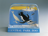 Close-Up of Figurines of Penguins in a Snow Globe Photographic Print