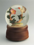 Figurine of a Hummingbird with a Flower in a Snow Globe Photographic Print