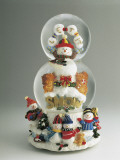 Close-Up of a Snowman and a Santa Claus in a Snow Globe Photographic Print