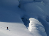 Lone Skier on Immense Glacier Photographic Print by Andrew Castellano