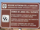 Close-Up of a Sign Board, Domus De Janas, Sardinia, Italy Photographic Print by W. Buss