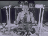 Boy Sits Dow to Thanksgiving Dinner Photographic Print by Lambert 