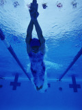 Female Swimmer Diving into Pool, Underwater View Photographie
