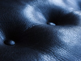 Detail of a Leather Sofa with Bluish Tint Photographic Print