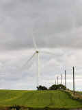 A Windmill and Telephone Poles in Bornholm, Denmark Photographic Print