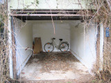 White Bike in White Garage Photographic Print by Kin Lush