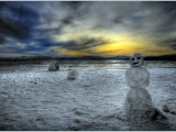Snowman on the Beach Fotografisk trykk av John B. Mueller Snowman on the Beach Fotografisk trykk av John B. Mueller