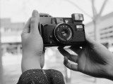 Person Taking Self-Portrait with Vintage Camera Photographic Print