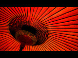 Horizontals: Red Parasol Photographic Print