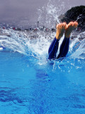 Female Swimmer Diving into Pool Photographic Print